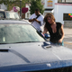 Illustration for article titled Noir Leather Bikini Car Wash Meetup Pictures